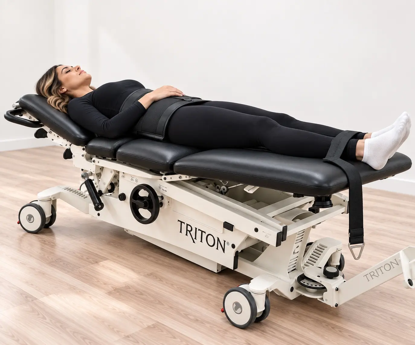 Patient comfortably positioned on a Triton spinal decompression table in Chino Hills, California