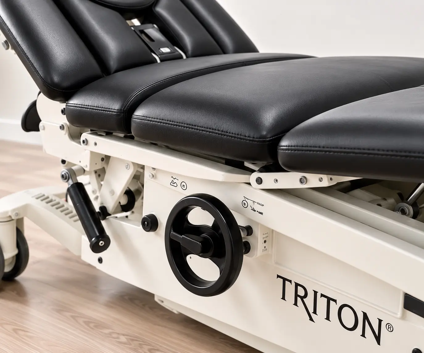 Close-up of the Triton spinal decompression table cushioning and precision adjustment controls